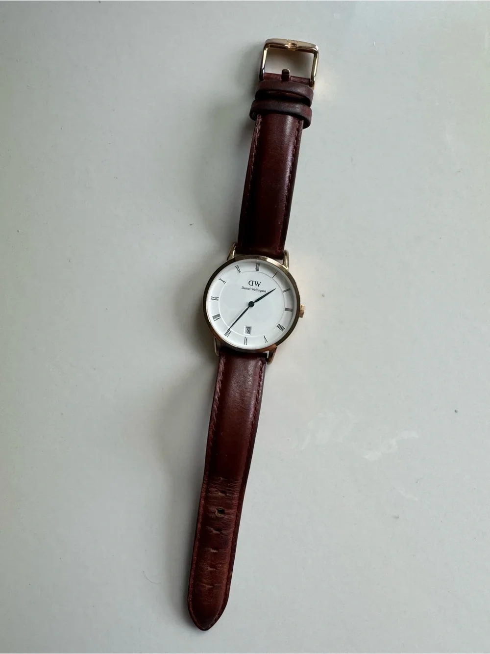 Daniel Wellington White Dial Watch with Gold Case and Brown Leather Strap